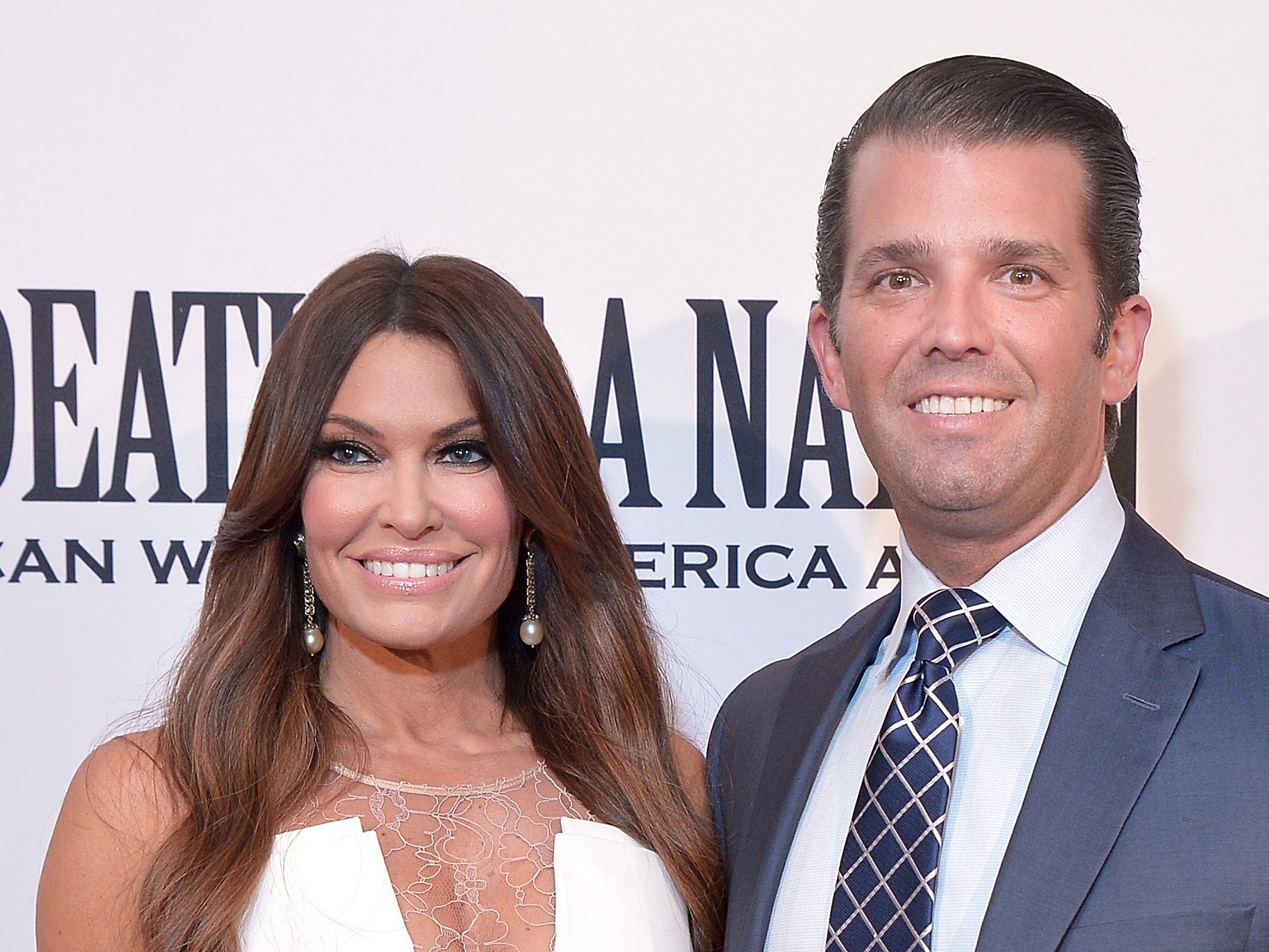 Donald Trump Jr spotted holding hands with a Florida socialite despite his engagement to Kimberly Guilfoyle