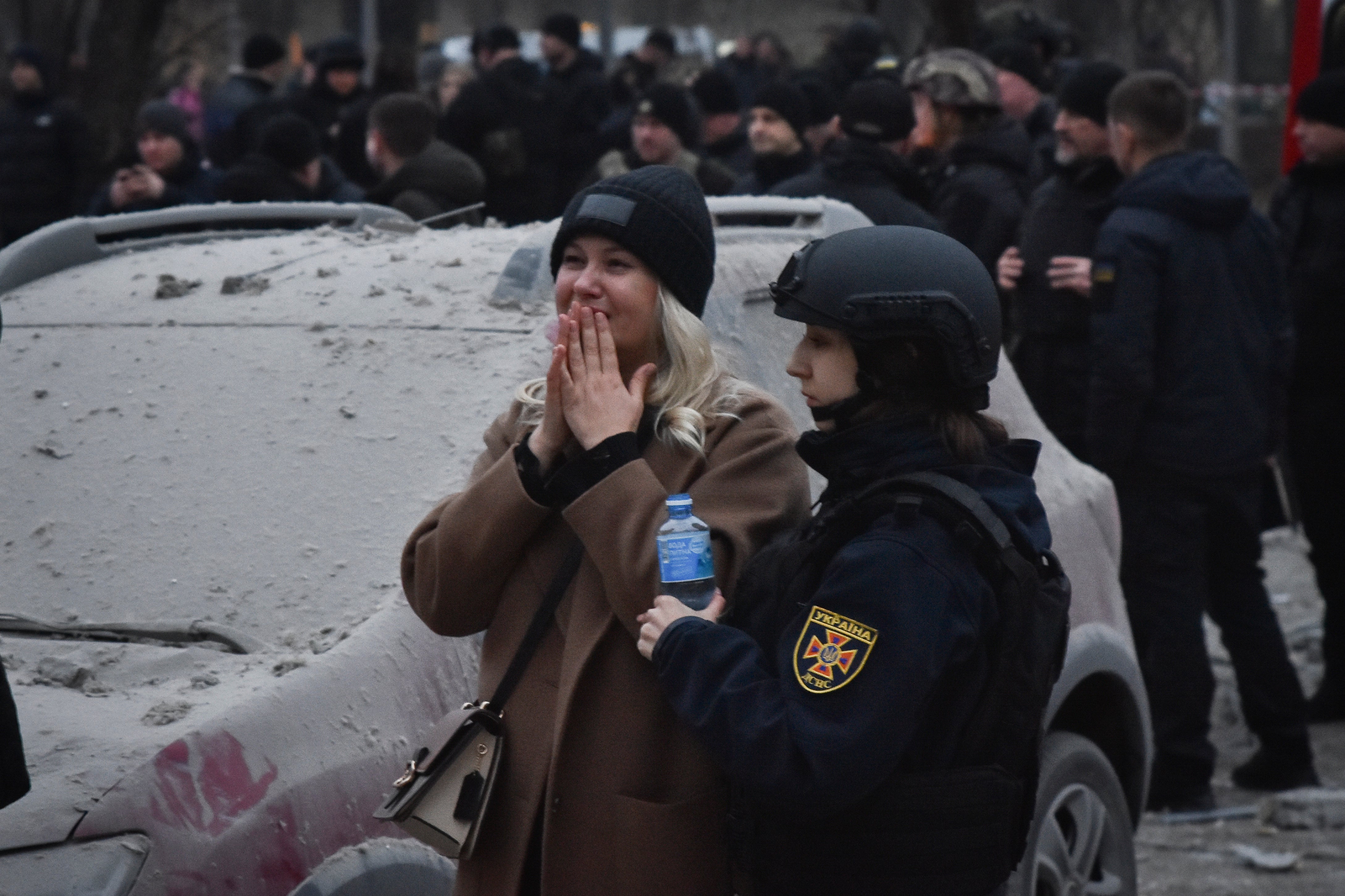 A woman cries after a Russian missile hit a private medical clinic in Zaporizhzhia