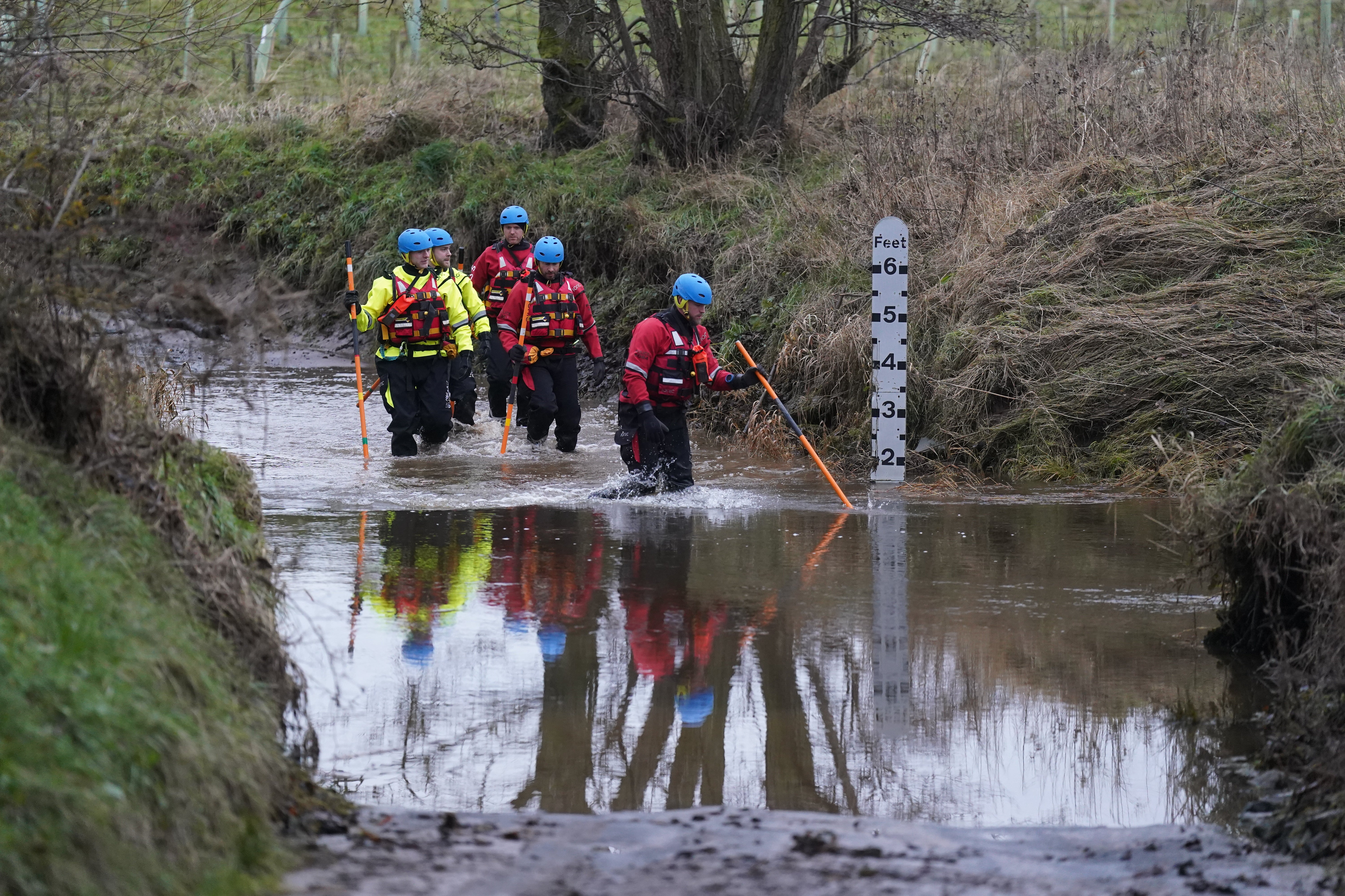 Members of a search and rescue team during the search operation at Abberwick Ford