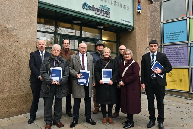 Families, friends, and campaigners outside the office of the Police Ombudsman for Northern Ireland, New Cathedral Building in Belfast, following the publication of the Police Ombudsman report on the IRA’s 1978 bombing at the La Mon hotel on the outskirts of Belfast (Oliver McVeigh/PA)