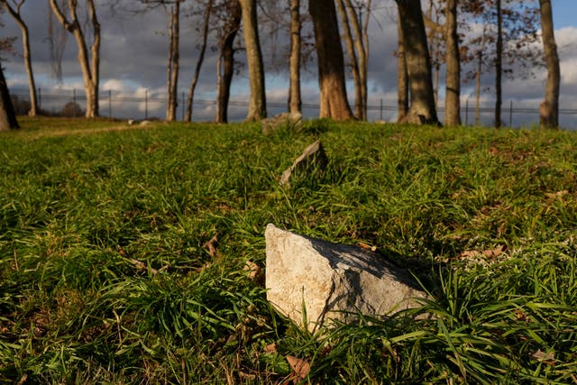 <p>Grave markers are seen in a slave cemetery</p>