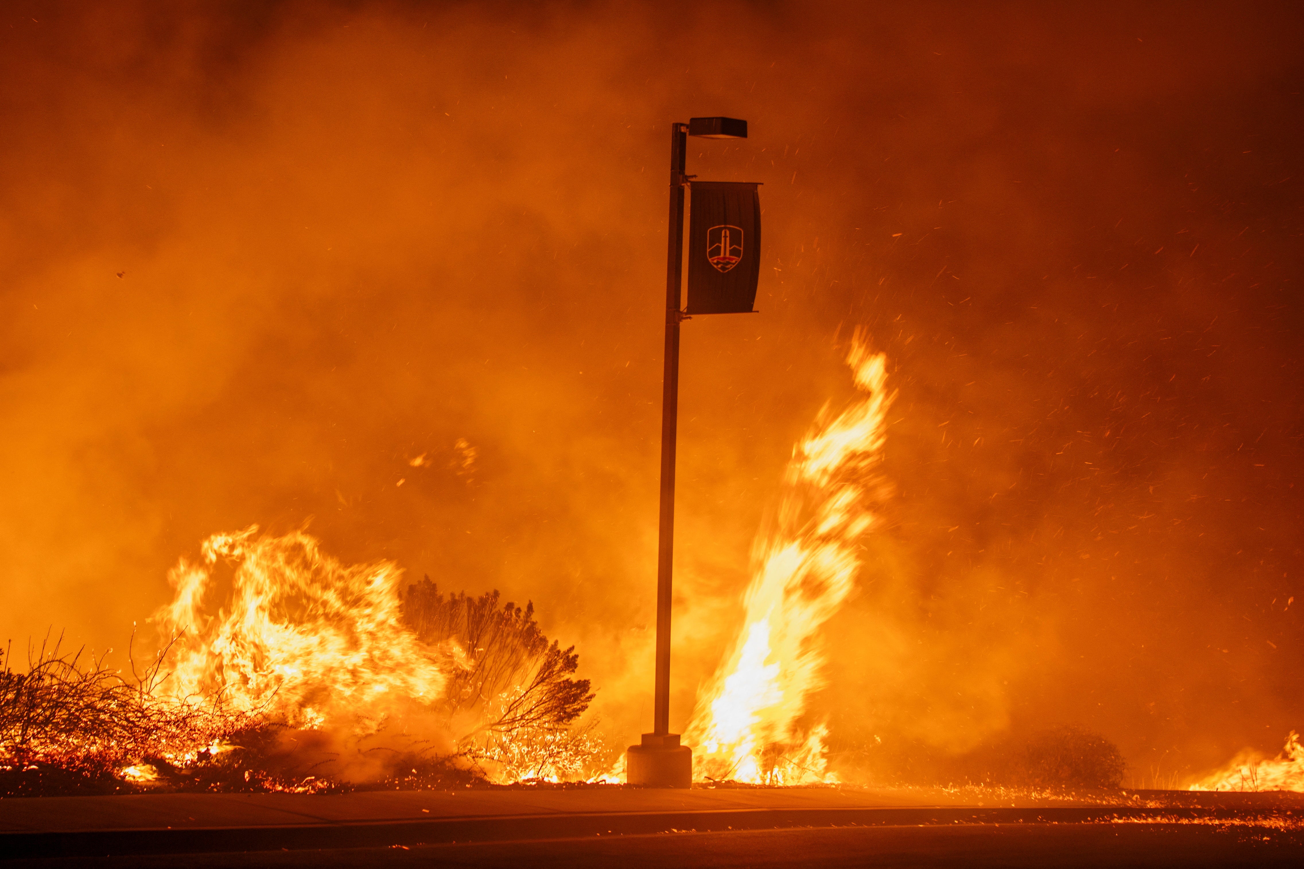 The Franklin Fire burns in Malibu, California, on Wednesday. Pepperdine University said active flames were diminished on campus