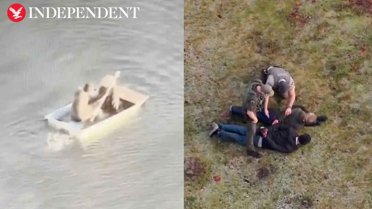 Moment alleged jewel thieves try to escape police on sinking rowboat