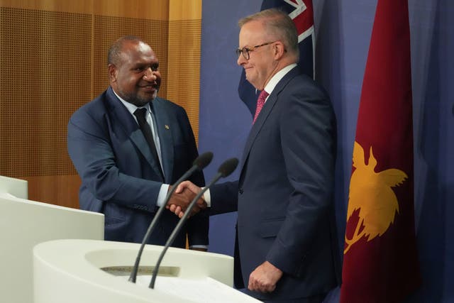<p>Australian prime minister Anthony Albanese, right, shakes hands with Papua New Guinea prime minister James Marape</p>
