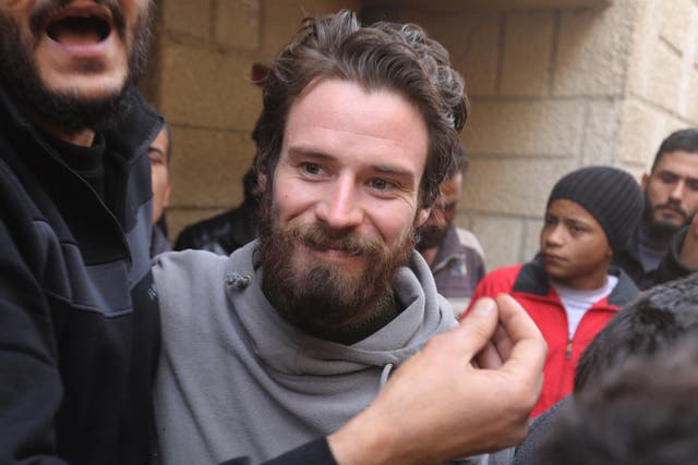 <p>Travis Timmerman, a US citizen who had entered Syria from Lebanon on a Christian pilgrimage and had been detained for several months, speaks with reporters in a house in Damascus</p>