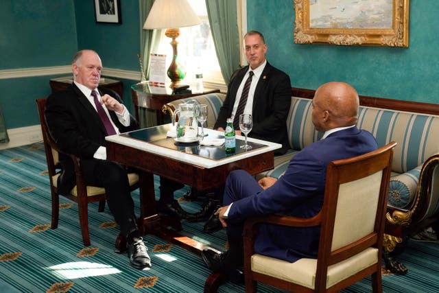 <p>A photo provided by City Hall shows Eric Adams, right, meeting with Trump’s incoming border czar Tom Homan, left, on Thursday </p>