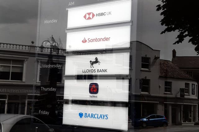 A banking hub window in Axminster, Devon (Vicky Shaw/PA Archive)