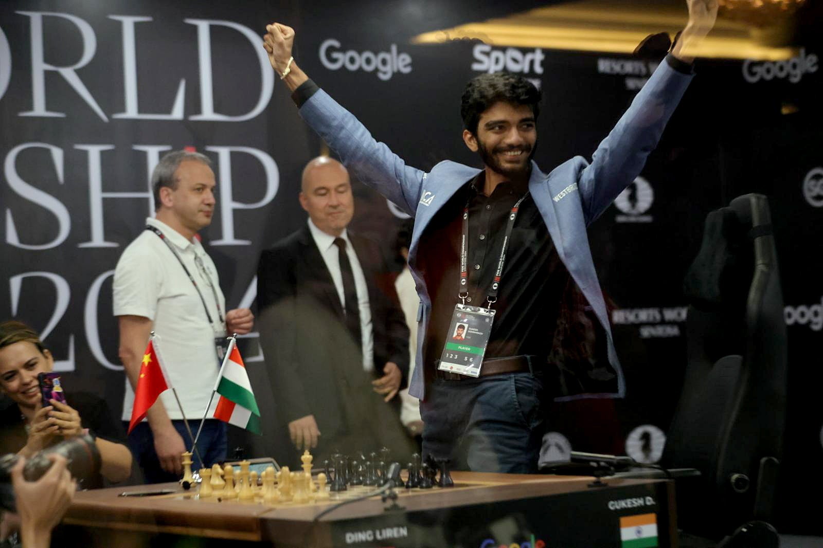 <p>Gukesh Dommaraju celebrates after winning against Ding Liren of China at the FIDE World Chess Championship in Singapore on 12 December 2024</p>