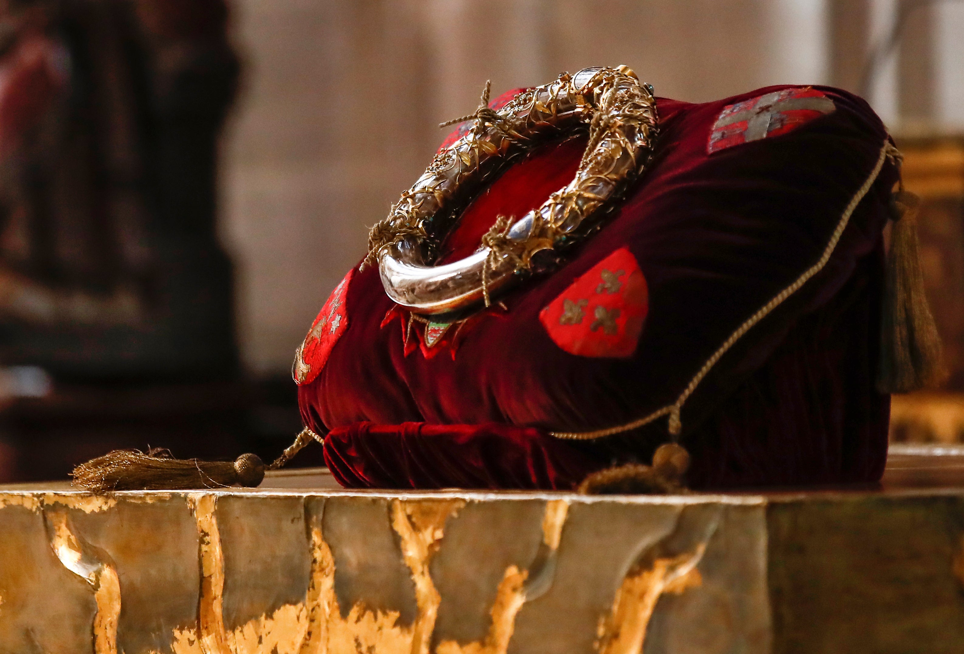 The crown of thorns relic believed to have been worn by Jesus Christ is displayed on the altar during a Good Friday veneration