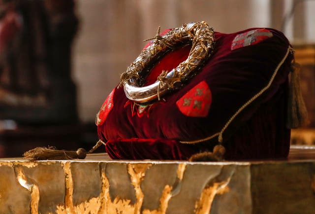 <p>The crown of thorns relic believed to have been worn by Jesus Christ is displayed on the altar during a Good Friday veneration</p>