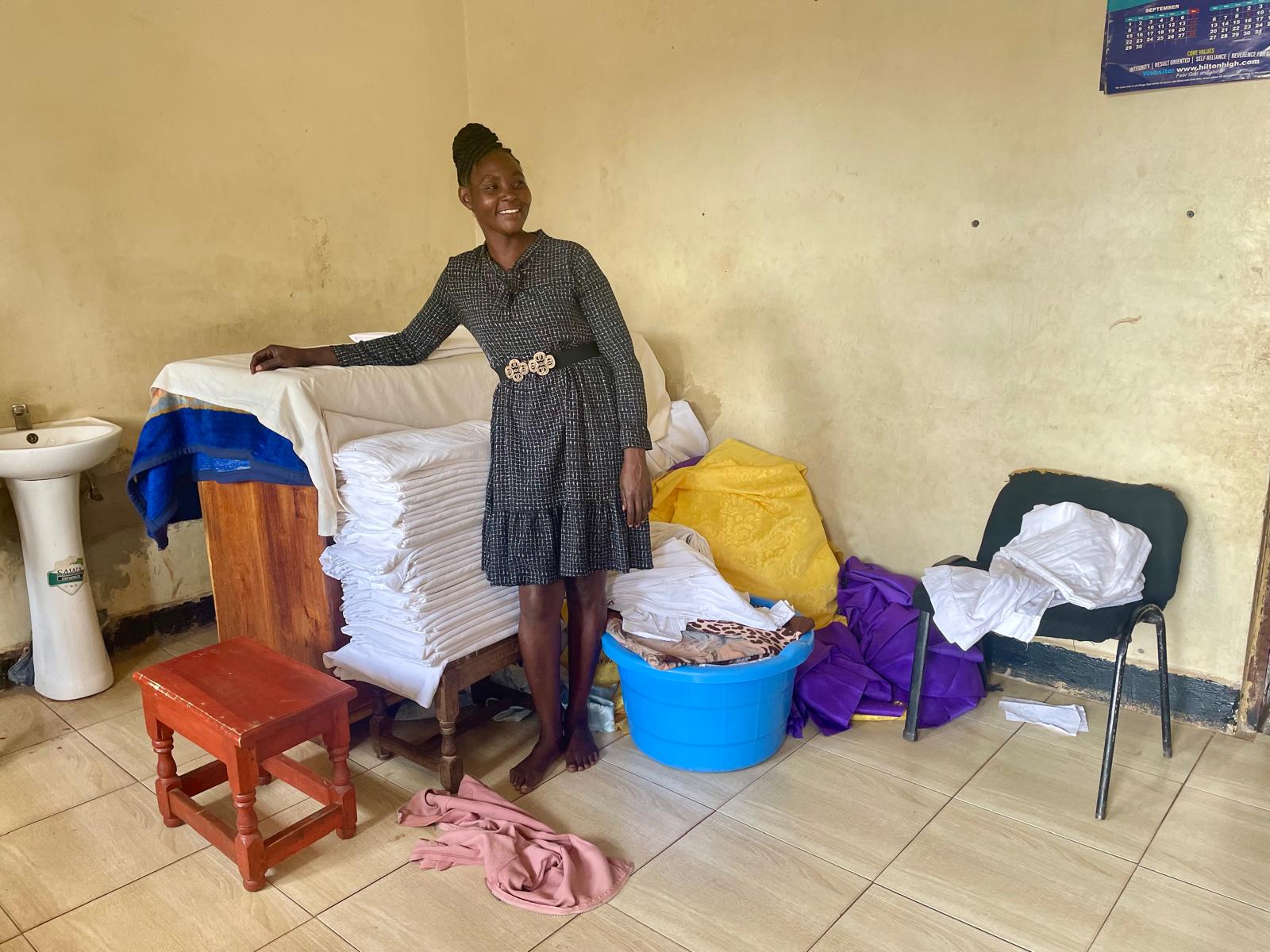 Salima in her laundromat in Kamuli, Uganda