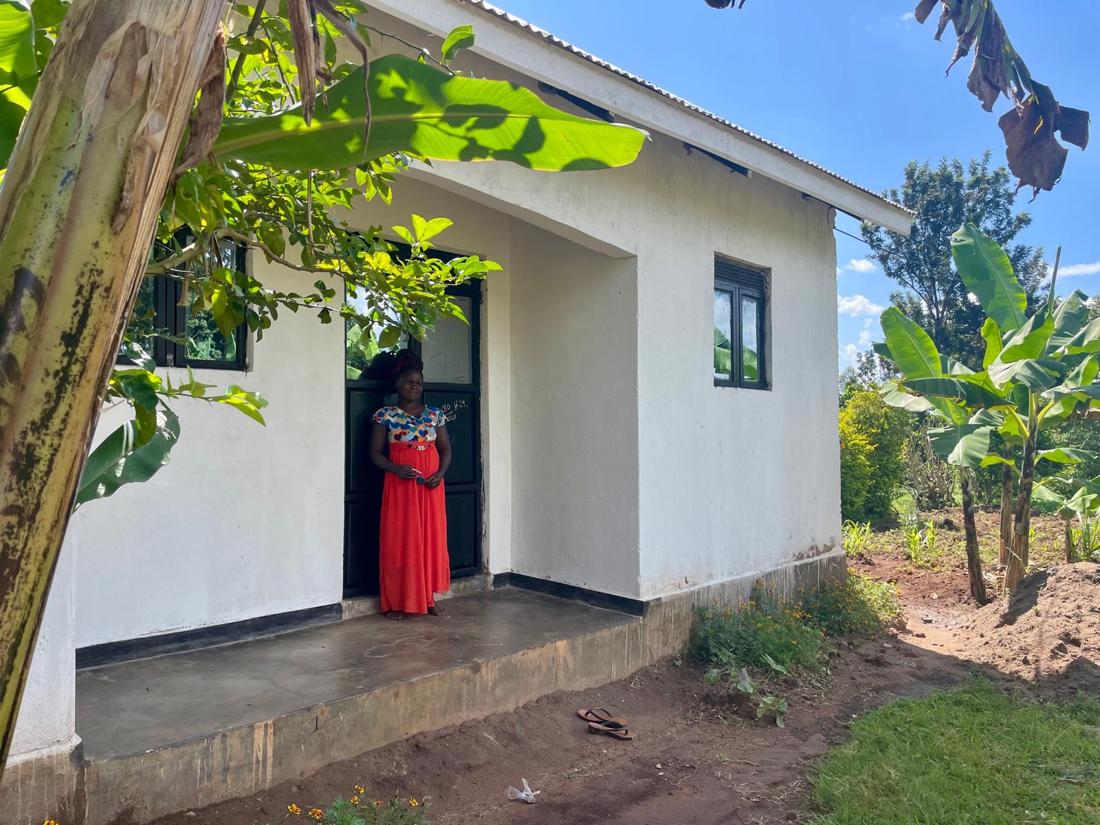 Sara at the home she built using her earnings from working at Zena