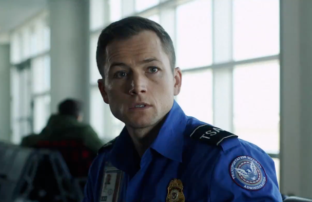 <p>Targon Egerton in Carry-On</p>