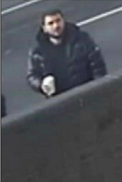 Detectives have released images of two men they want to identify after £200,000 of designer bags were stolen