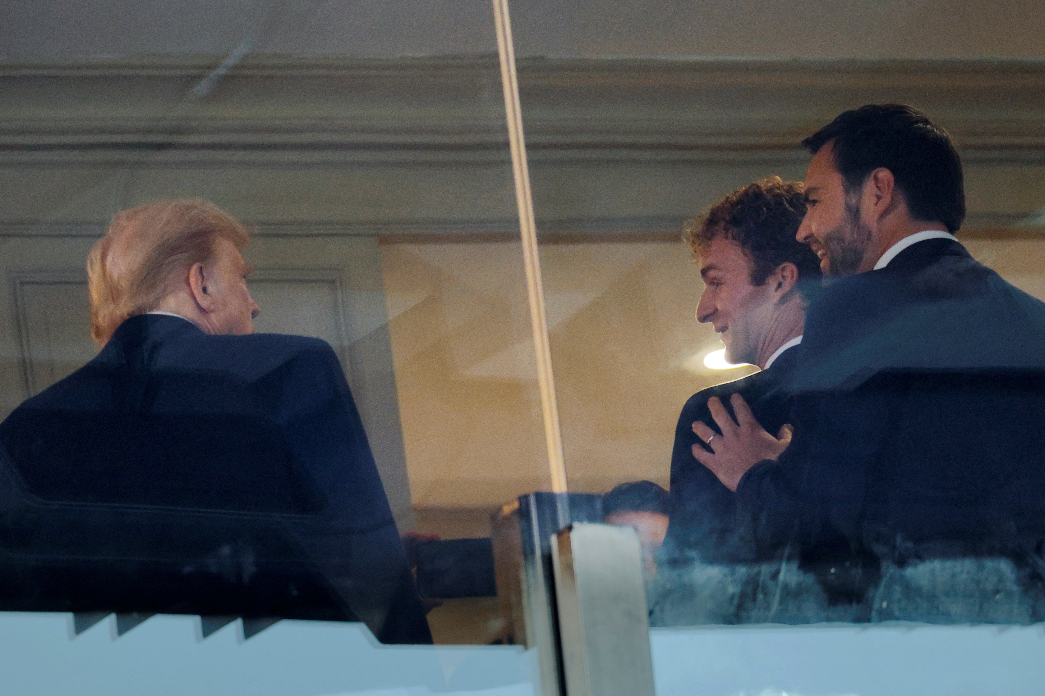 Donald Trump meets Daniel Penny, a former US Marine who was found not guilty of criminally negligent homicide in the 2023 chokehold death of a man on a New York City subway train, at the Army-Navy football game in Maryland on December 14