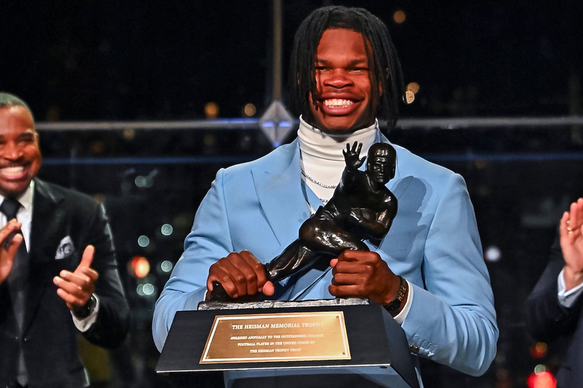 The University of Colorado Boulder’s Travis Hunter accepts the 2024 Heisman Trophy