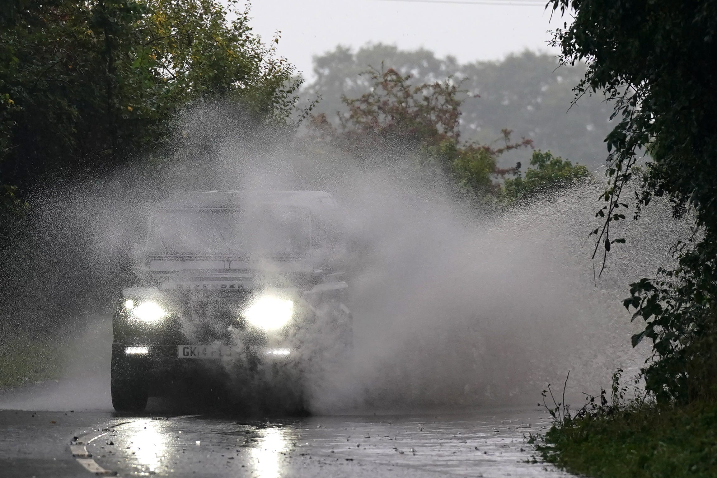 A car driving in wet conditions (Jacob King/PA)