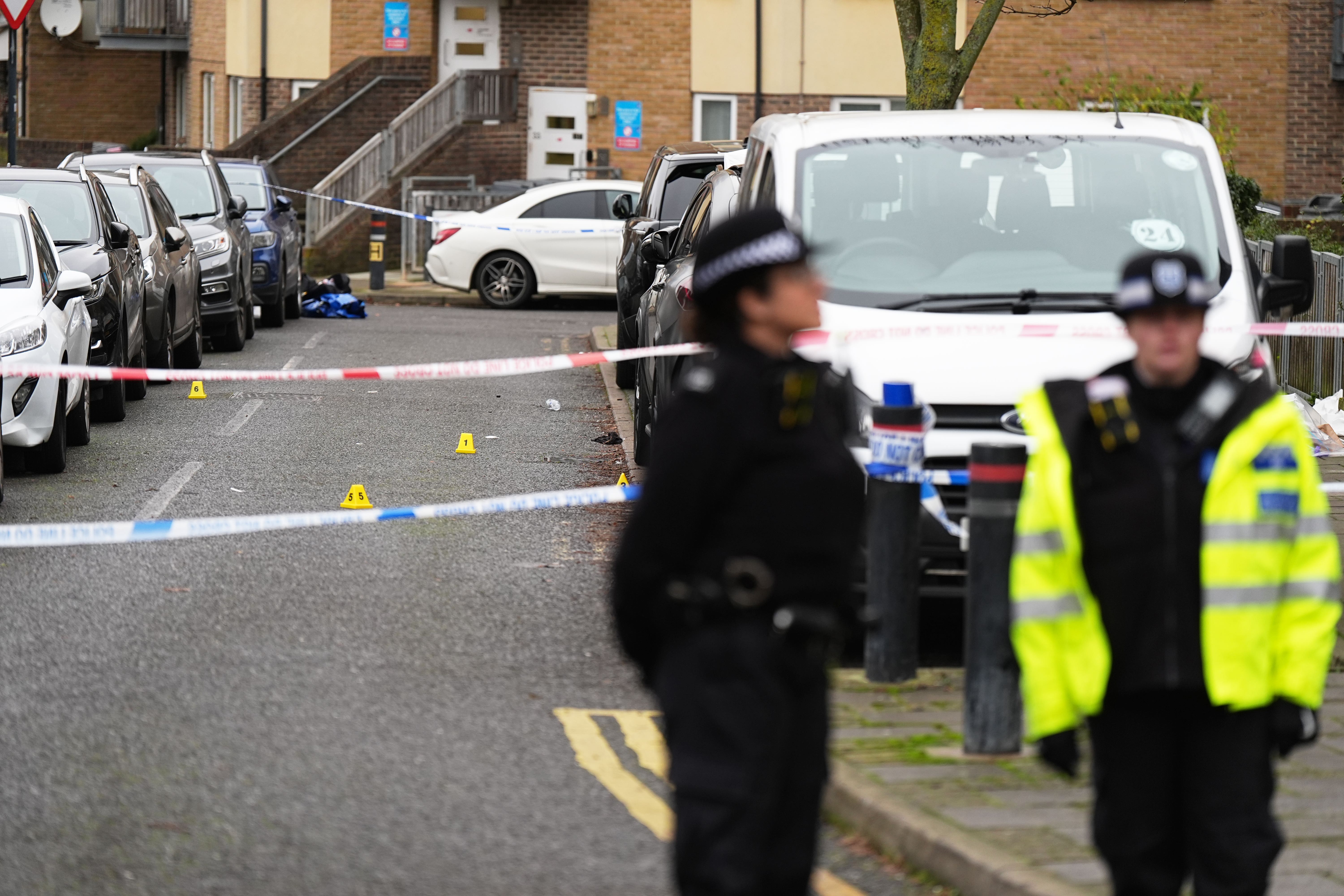 A police cordon at the scene on Gifford Road, Brent, after a woman has died and a man remains in a critical condition following a shooting in north-west London (Aaron Chown/PA)