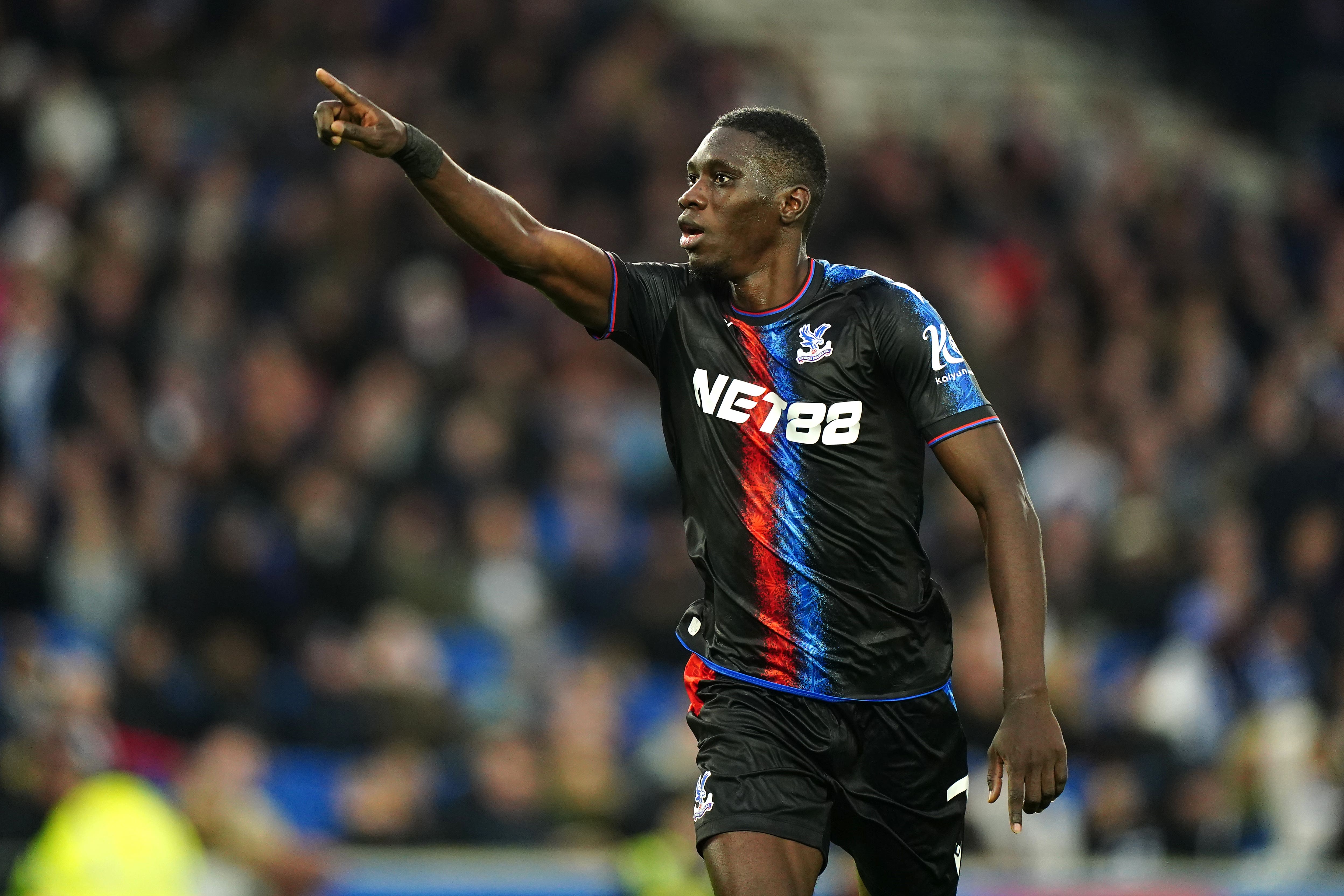 Ismaila Sarr celebrates scoring Palace’s third goal (Zac Goodwin/PA)