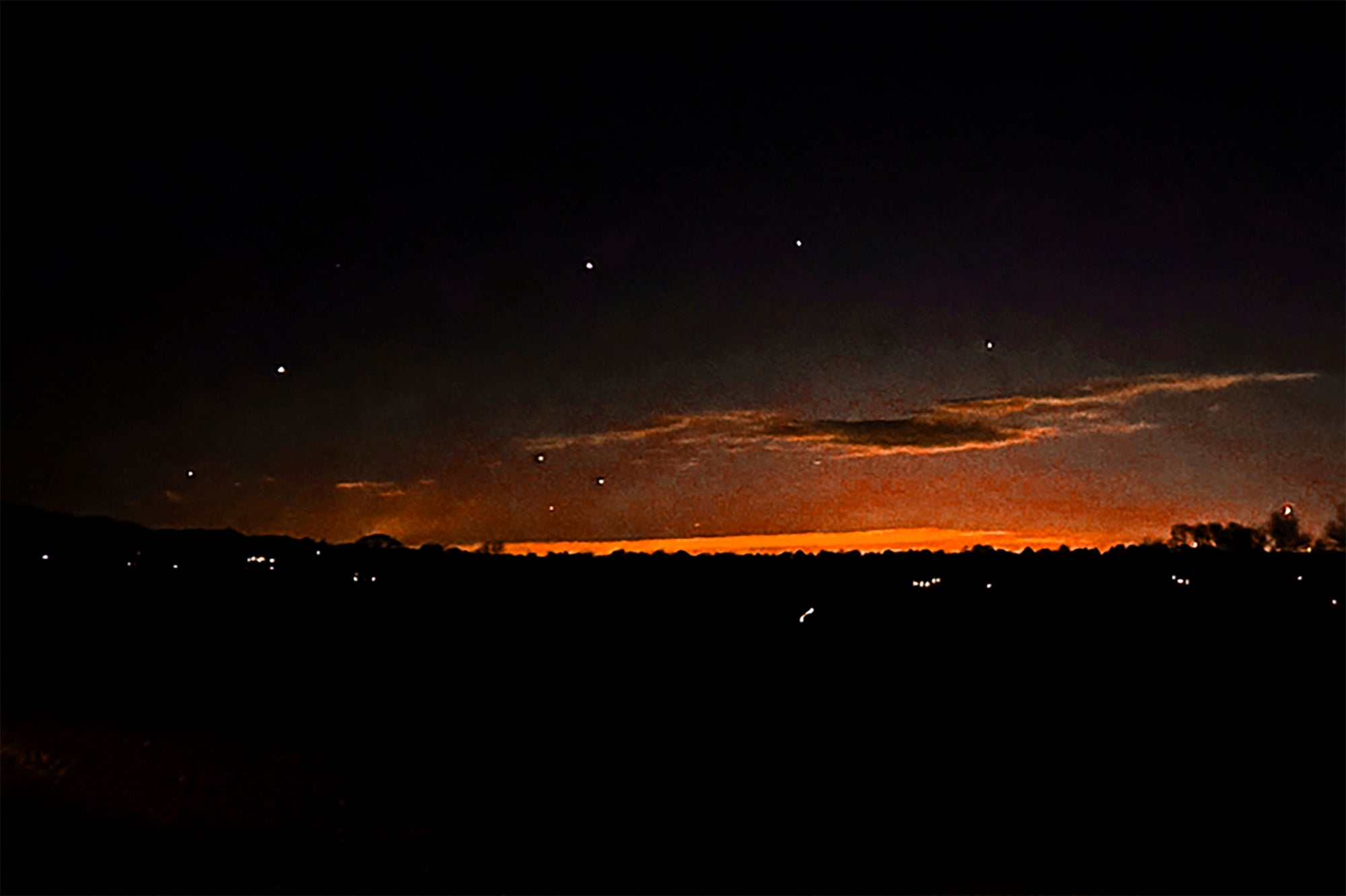 A person’s photo of what they believe to be a drone hovering after dark in Lebanon Township, New Jersey