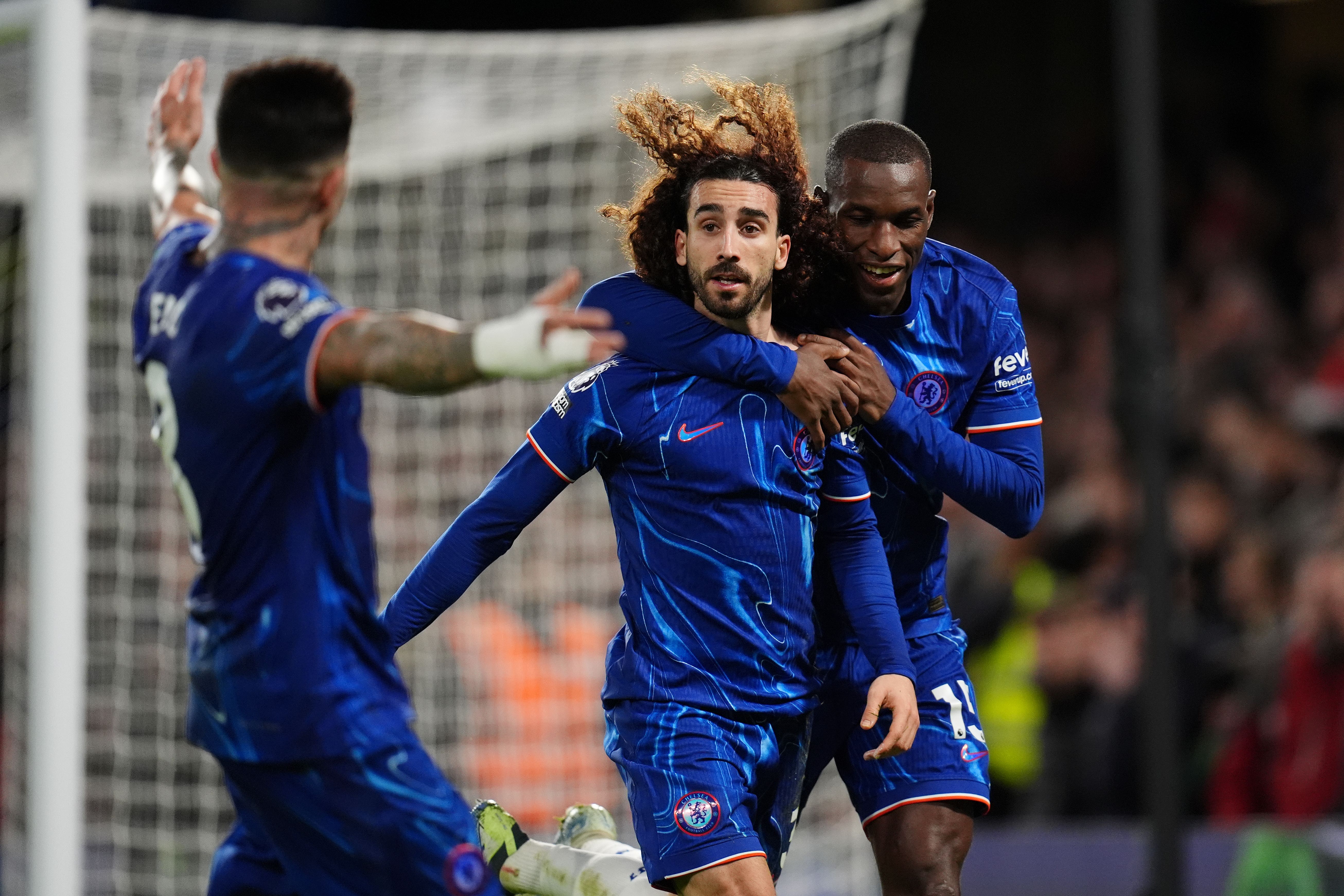 Chelsea’s Marc Cucurella (centre) celebrates after scoring the opening goal with team-mate Nicolas Jackson during the Premier League match at Stamford Bridge, London. Picture date: Sunday December 15, 2024.