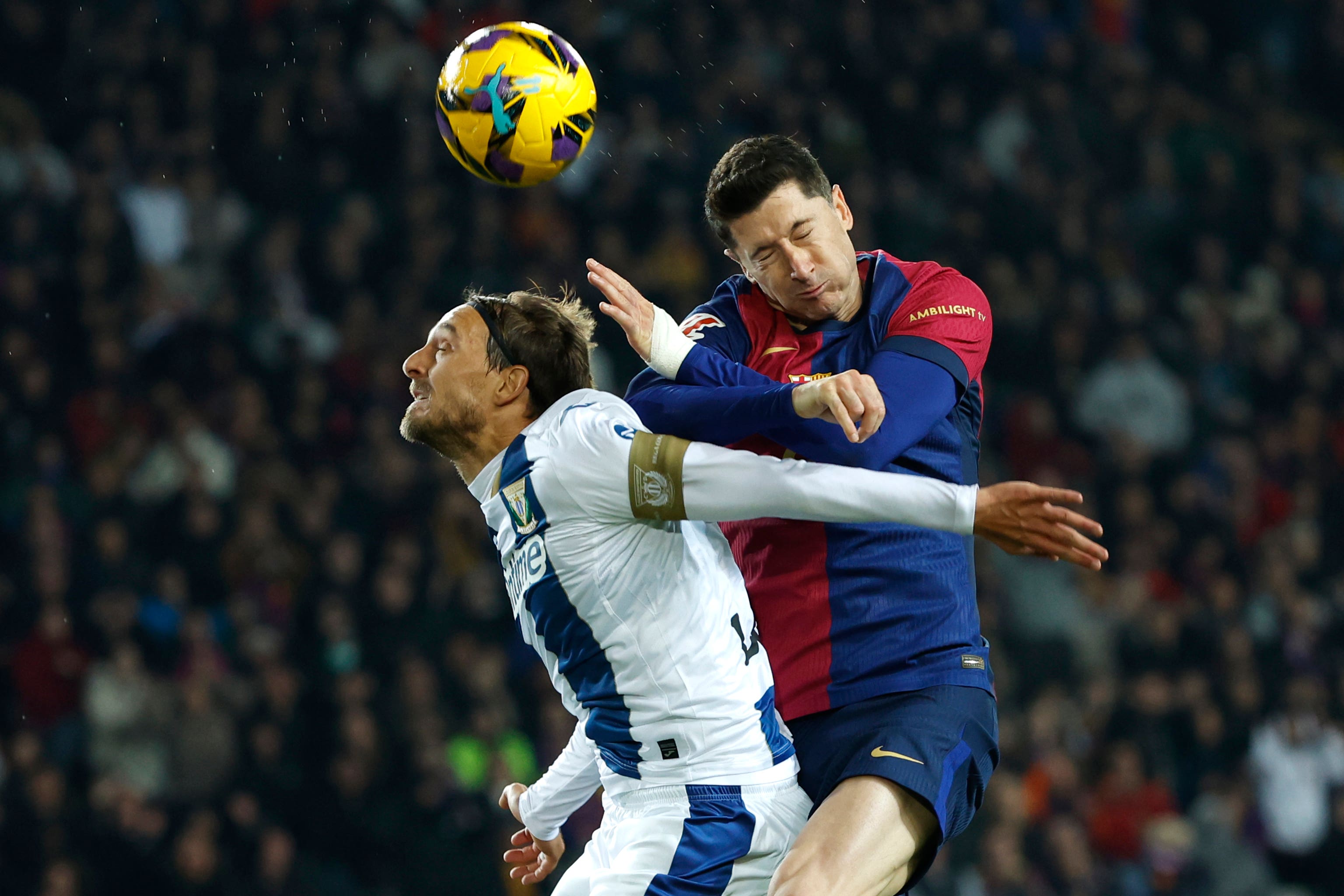 Barcelona’s Raphinha, left, and Pau Victor react after Leganes score