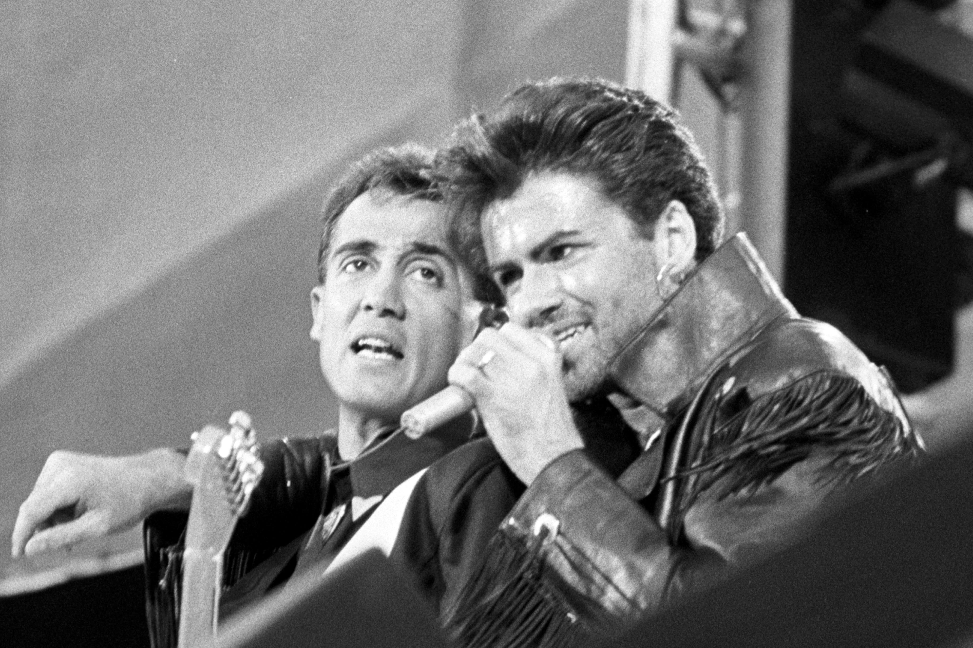 Andrew Ridgeley, left, and George Michael’s hit has been voted the UK’s favourite song to kick off Christmas (PA)