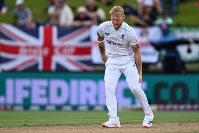 England captain Ben Stokes grabs at his leg while bowling (Andrew Cornaga/Photosport/AP)