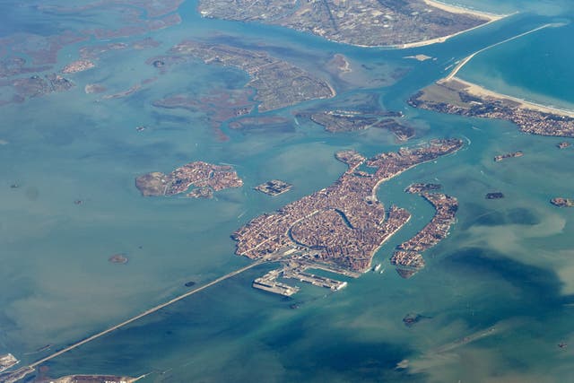 <p>Venice’s lagoon has welcomed a new island despite worries about the city sinking over the next century</p>