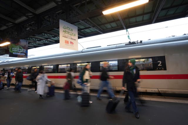 <p>Passengers prepare to board the first Paris-Berlin high speed train</p>