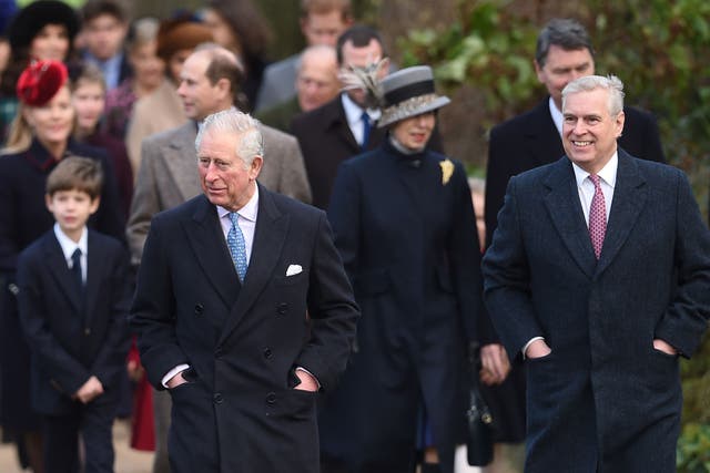 <p>Andrew walks with his brother Charles at the head of the royal family on the way to Church on Christmas Day 2017 (Joe Giddens/PA)</p>