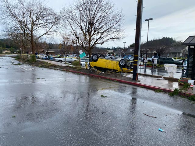 <p>A vehicle is overturned following an EF-1 tornado on Mount Hernon Drive in Scotts Valley California. Multiple people were injured by the twister  </p>