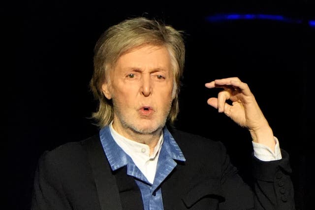 <p>Paul McCartney on stage in Manchester </p>