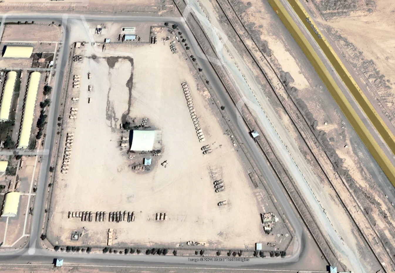 Satellite view of humvees and other military vehicles in 2019 parked at the Kandahar Air Base, main point for the Nato forces inside Afghanistan