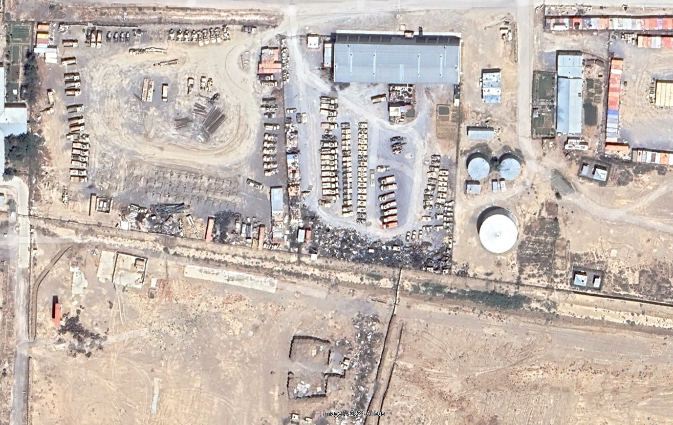 Satellite view of of destroyed humvees and other military vehicles seen in Kandahar this year