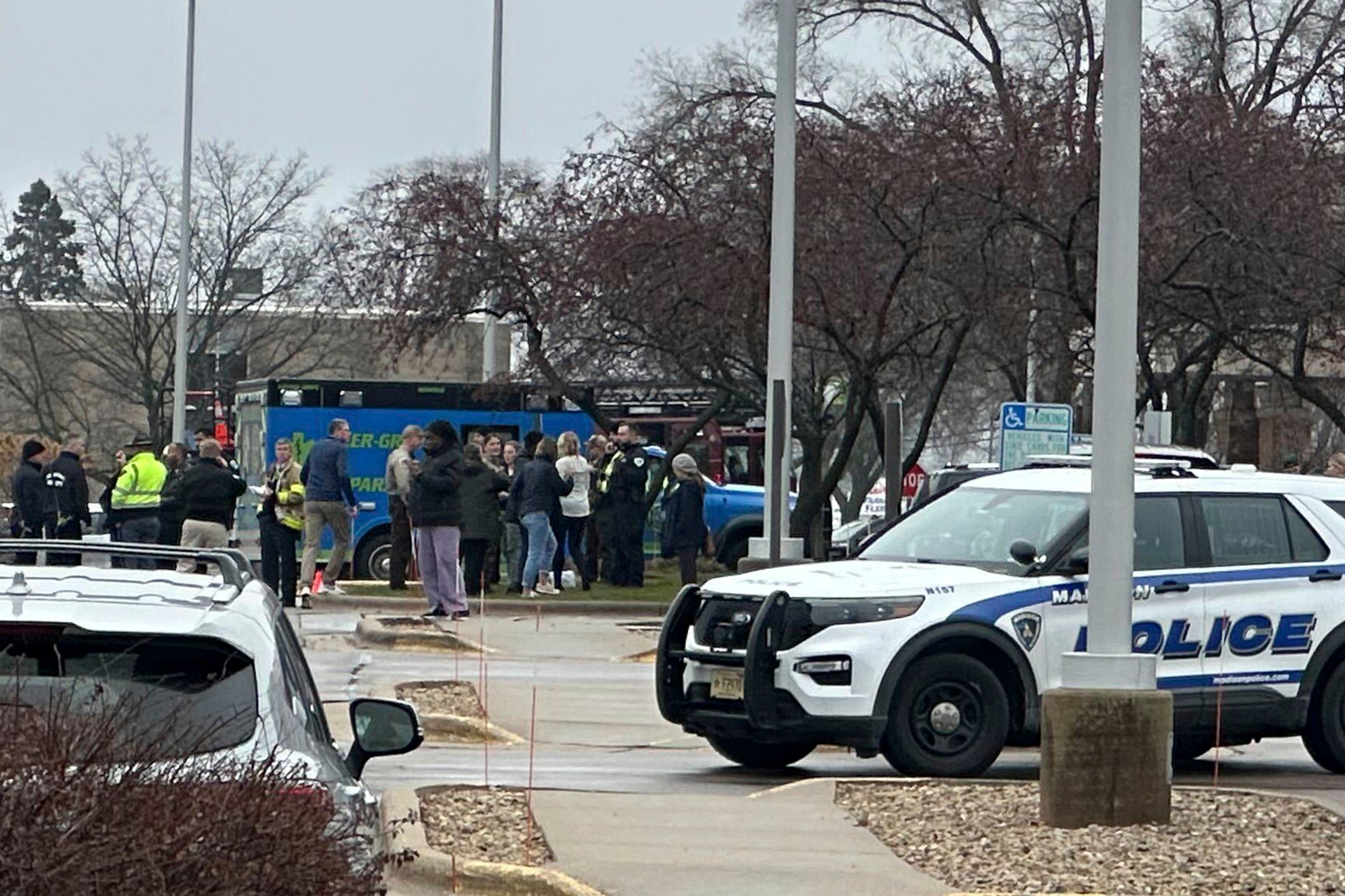 Emergency vehicles pictured outside of the SSM Health clinic in Madison, Wisconsin, where parents are being reunified with children after a shooting at the Abundant Life Christian School