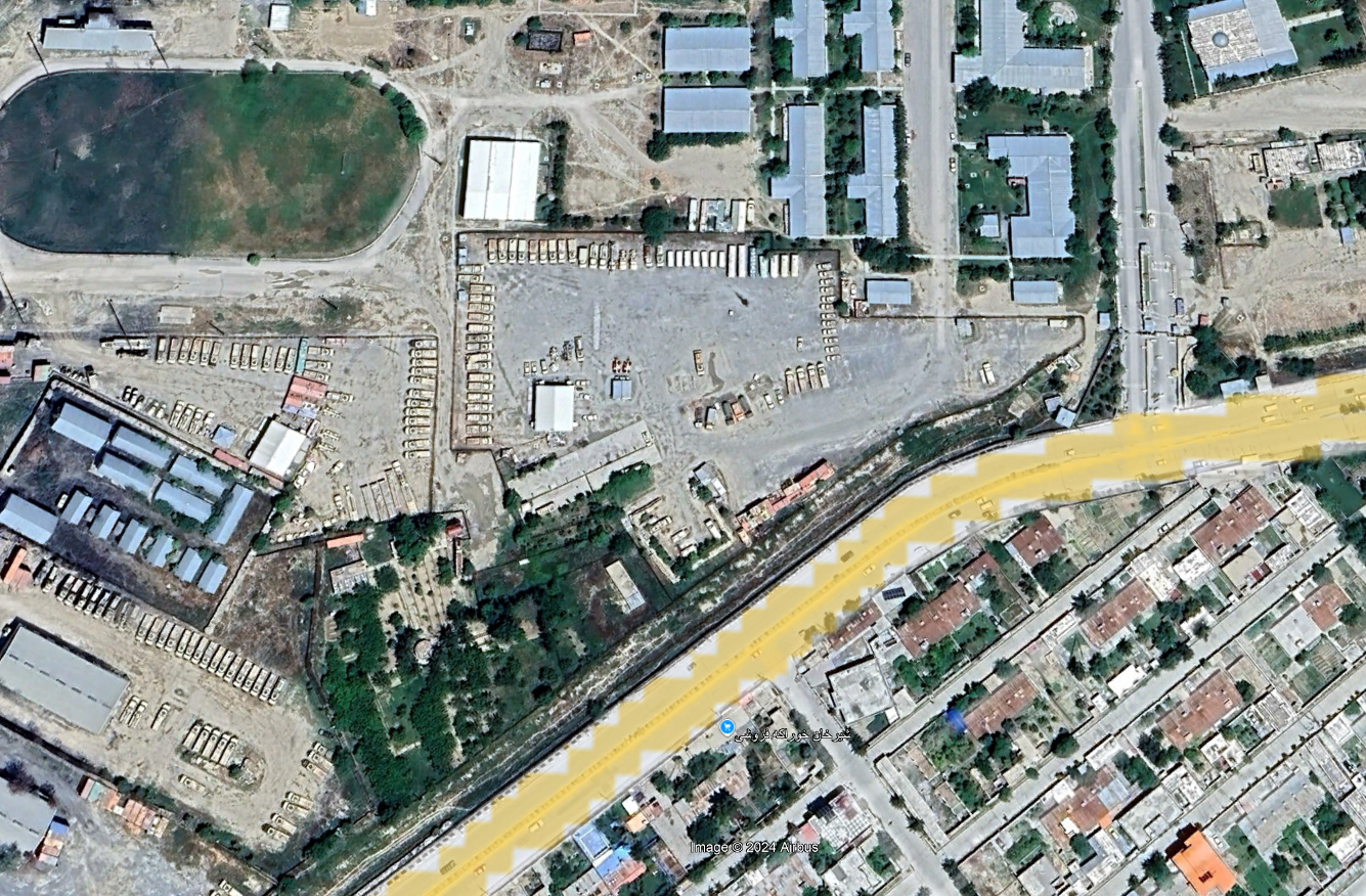 Satellite view of humvees and other military vehicles stationed near Kabul International Airport in June 2024