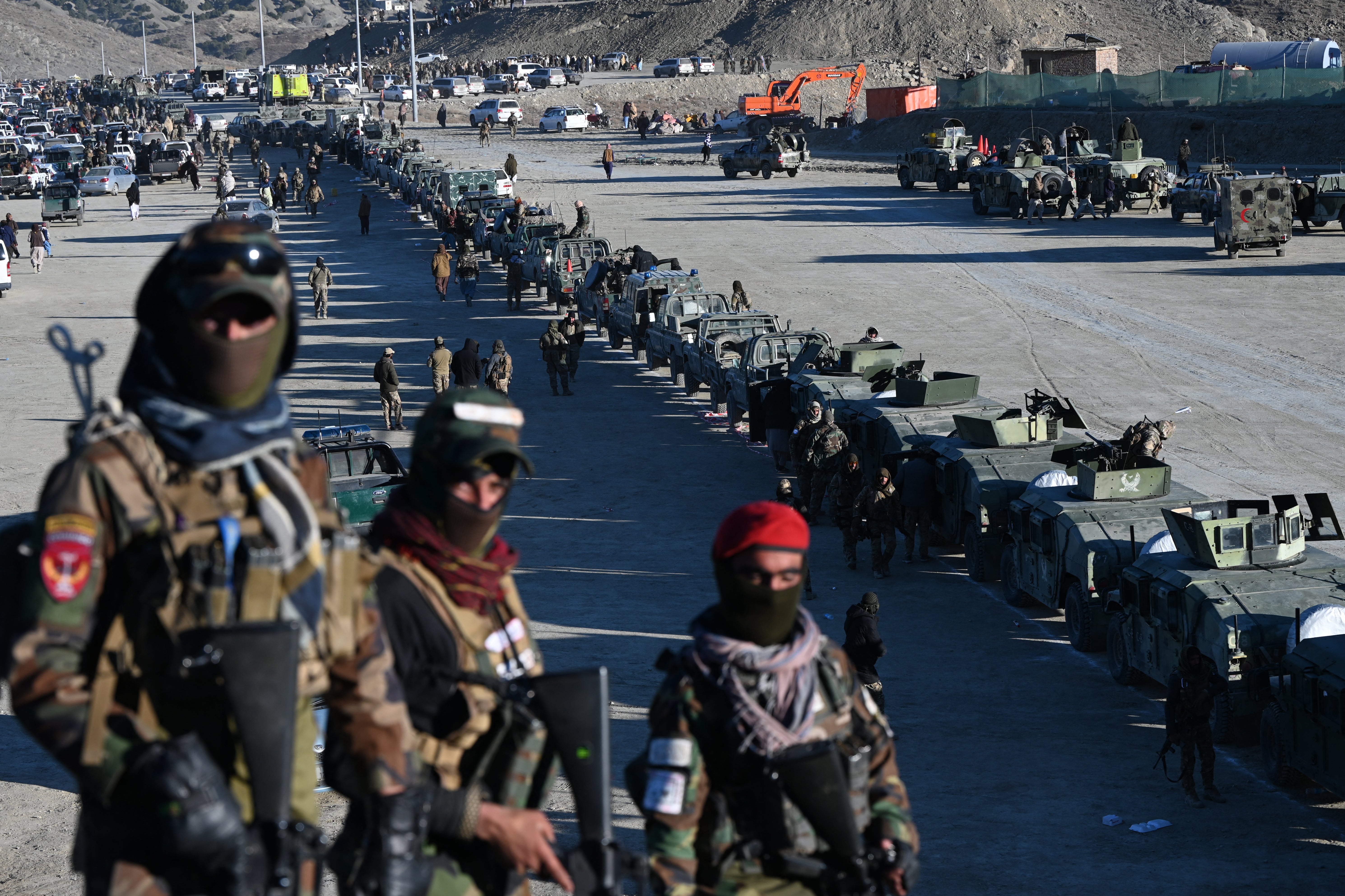 Taliban’s Humvees are seen parked during the funeral ceremony of Khalil Haqqani