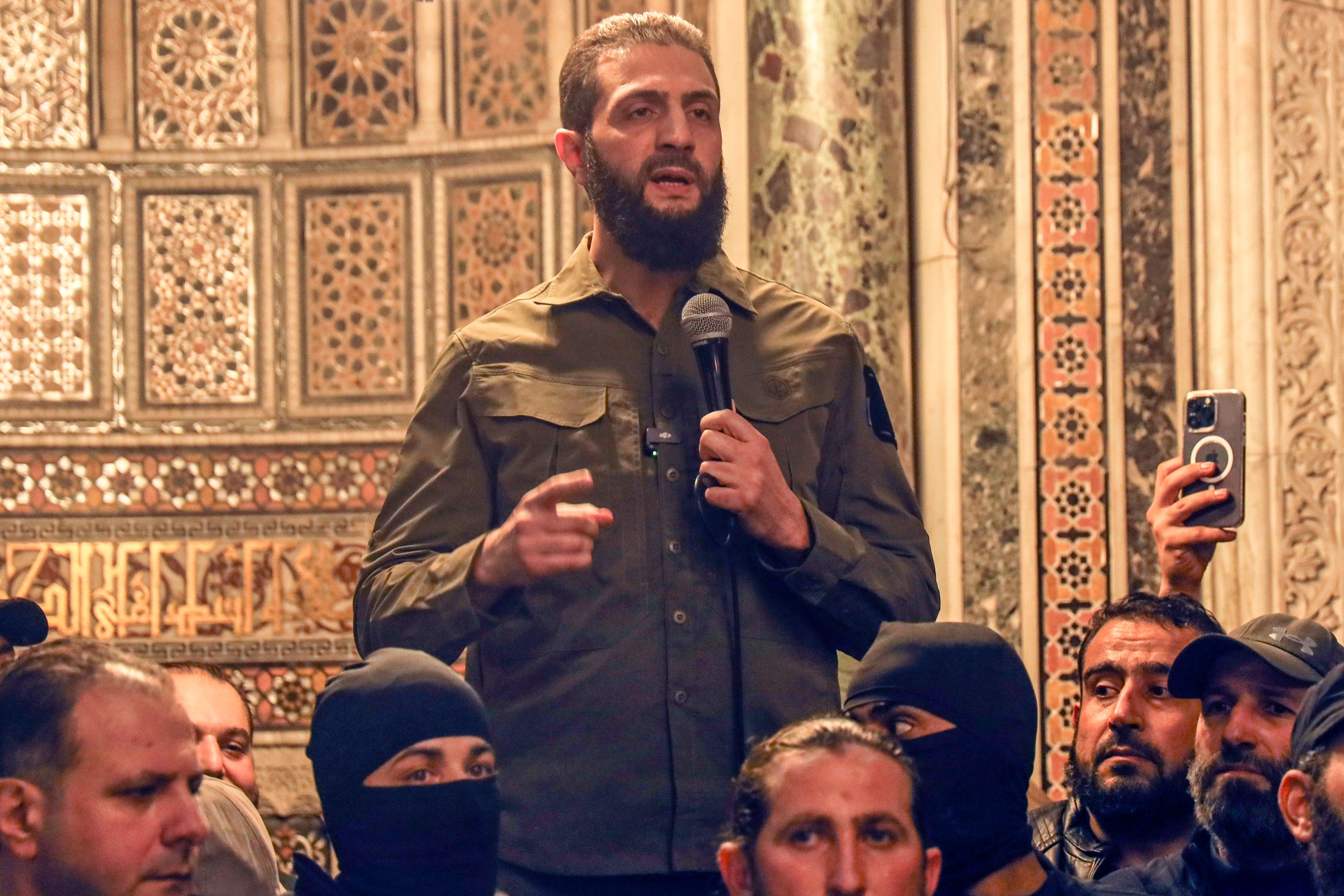 HTS leader Ahmad al-Sharaa, formerly known as Mohammed al-Golani, has met British diplomats in Damascus (Omar Albam/AP)