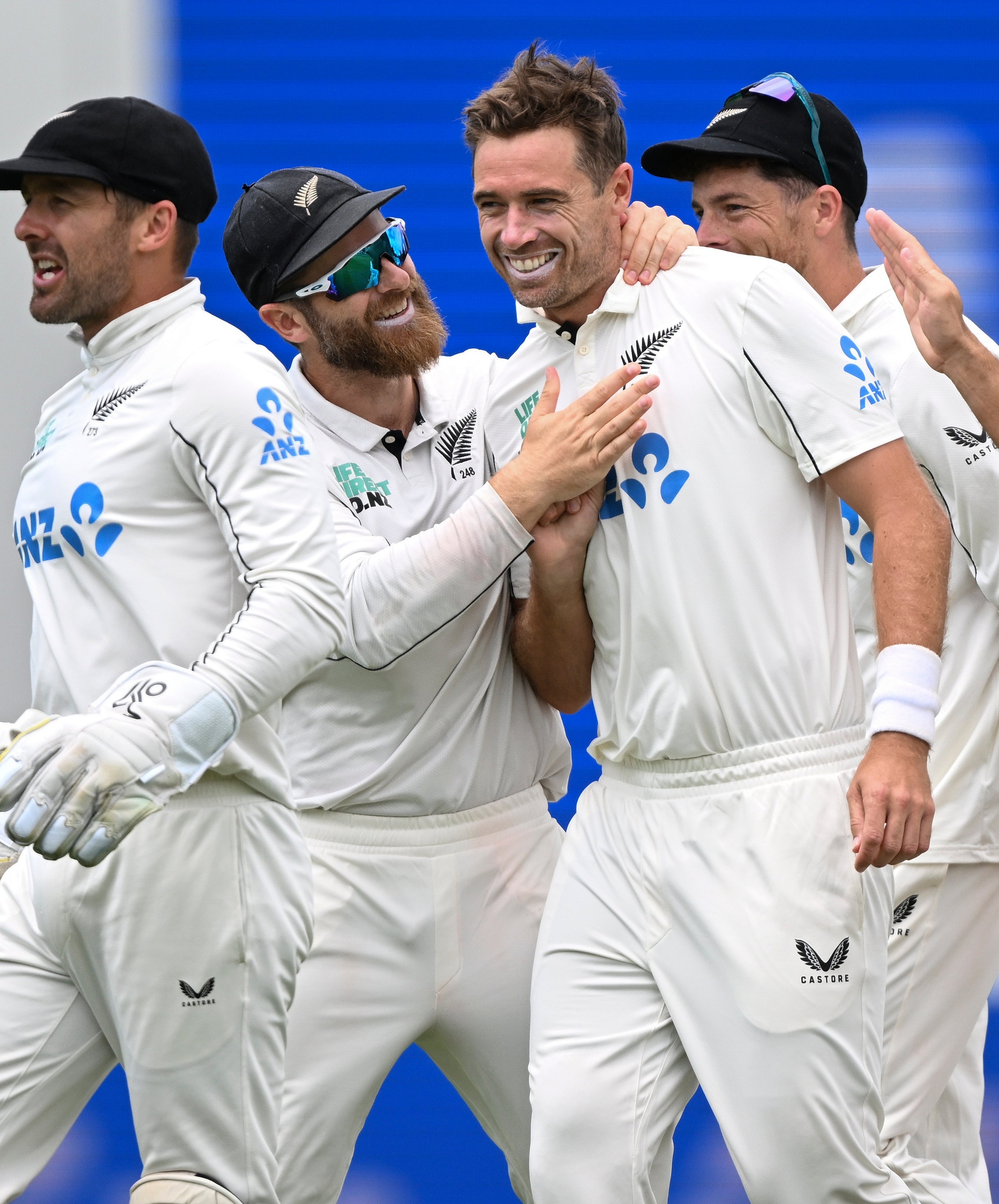 New Zealand bowler Tim Southee is congratulated by teammates after taking the wicket of England’s Jacob Bethell (Andrew Cornaga/Photosport/AP)