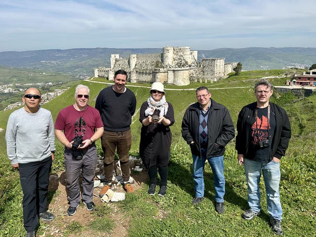 <p>On tour: A Lupine Travel group in Syria in March 2024 at Krak des Chevaliers castle</p>