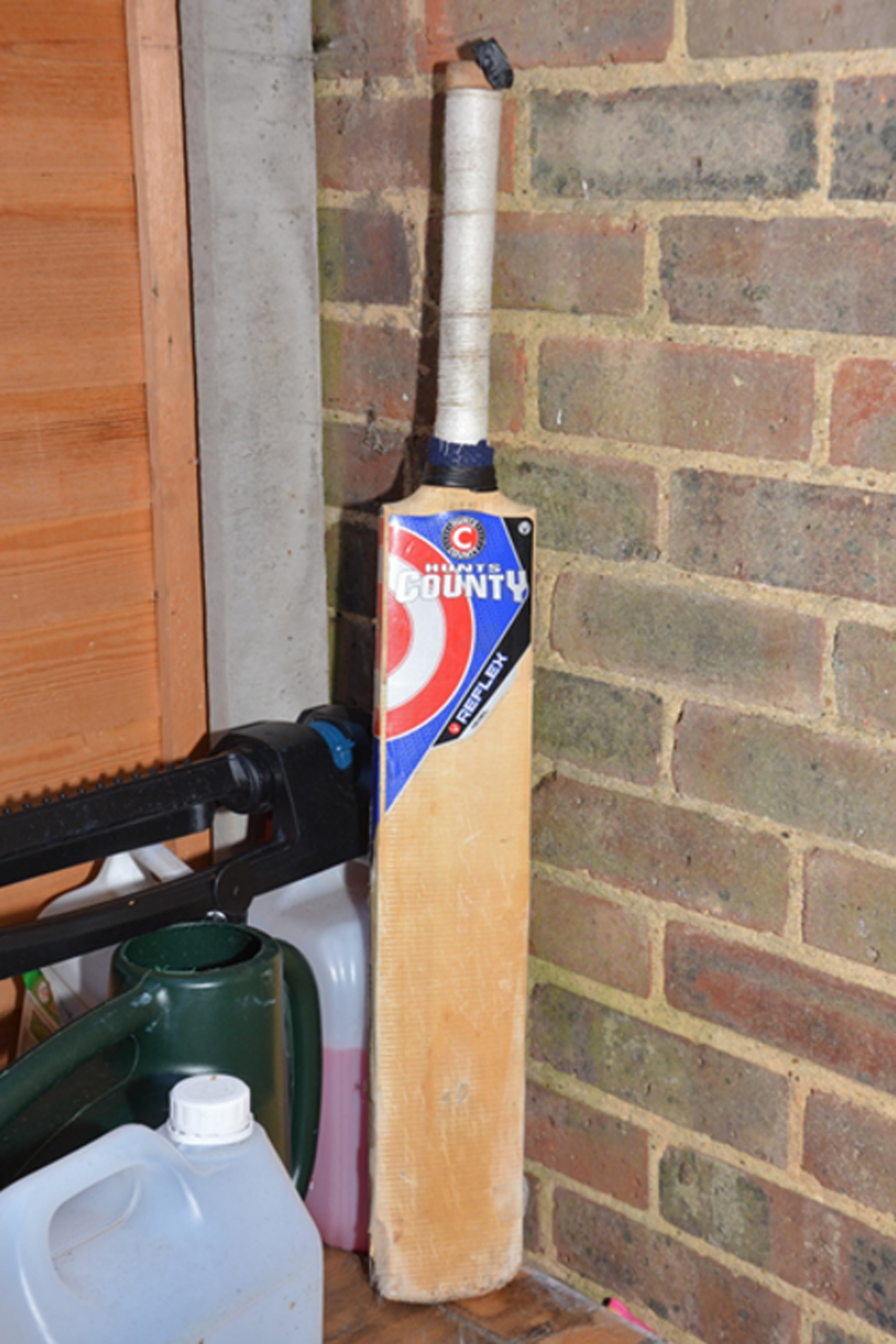 The cricket bat used to abuse Sara at the family home in Woking