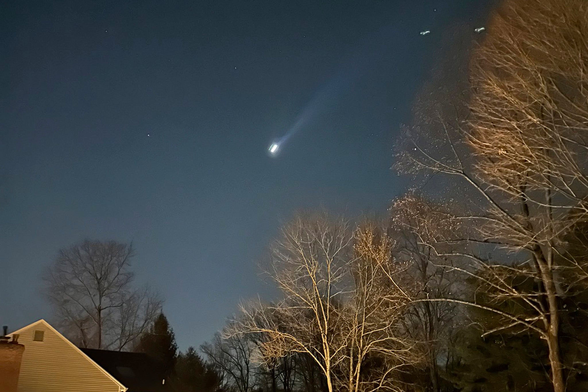 This photo provided by Brian Glenn shows what appears to be multiple drones flying over Bernardsville, New Jersey