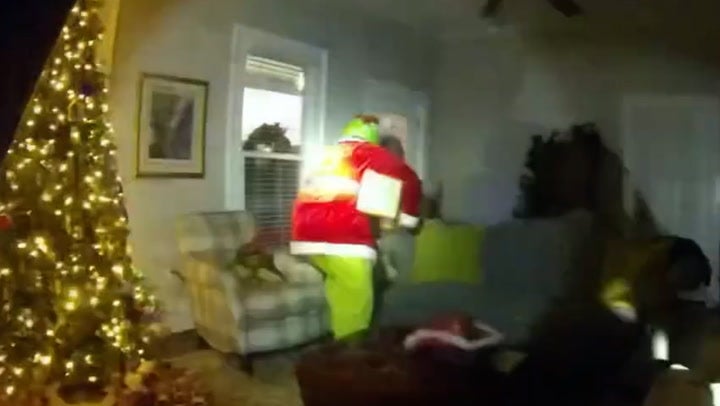 <p>How the Grinch almost stole Christmas as police bodycam captures culprit in action.</p>
