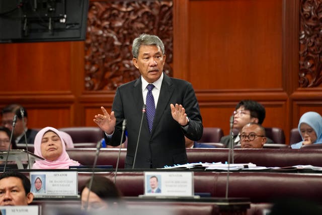 <p>Malaysia’s foreign minister Mohamad Hasan speaking during a parliament session</p>