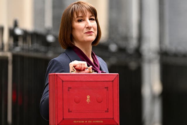 <p>Chancellor of the Exchequer, Rachel Reeves, poses with the red Budget Box</p>