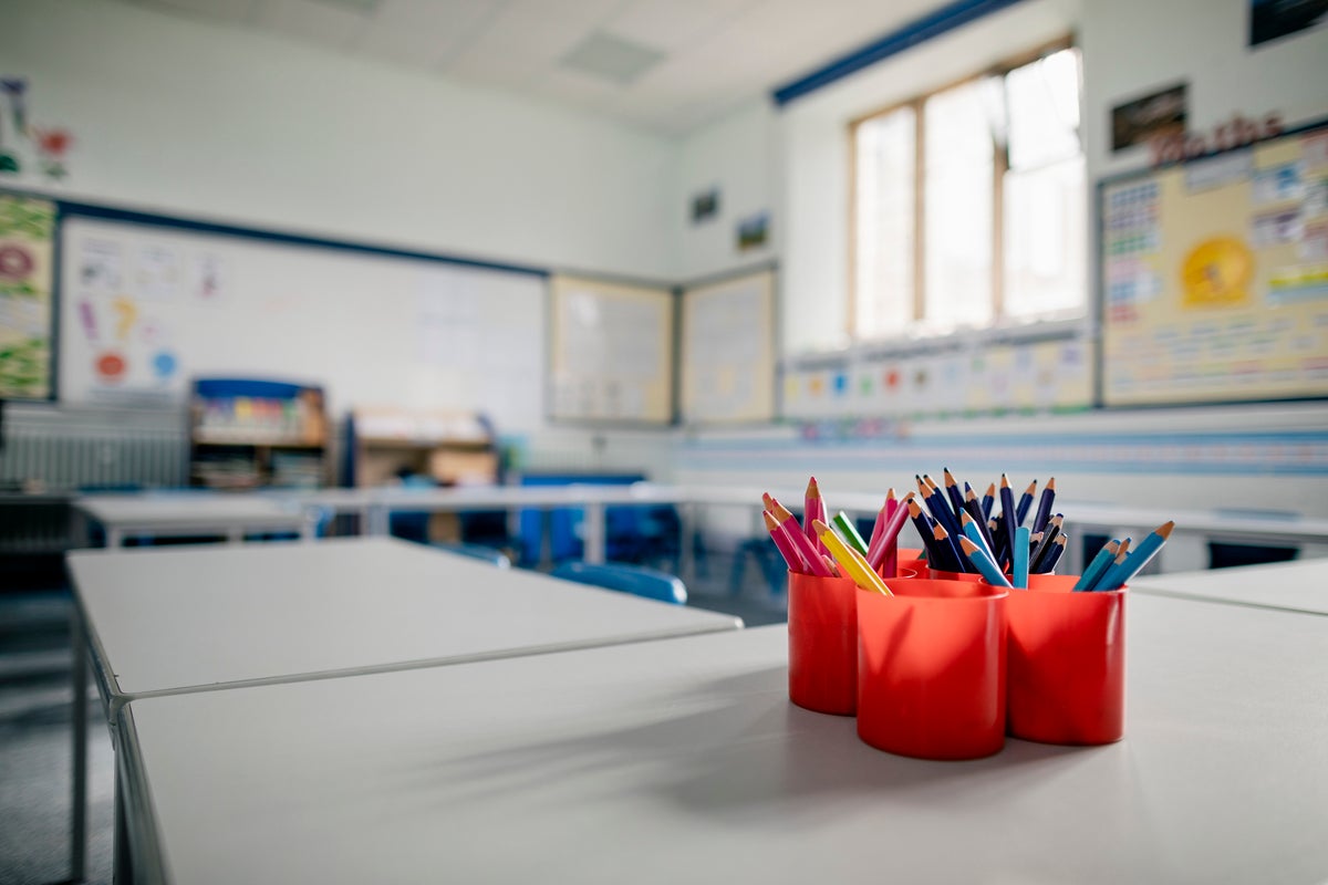 Former headteacher banned from classroom for life over child sex images