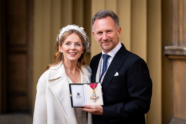 Christian Horner and wife Geri at Buckingham Palace in London (Aaron Chown/PA)