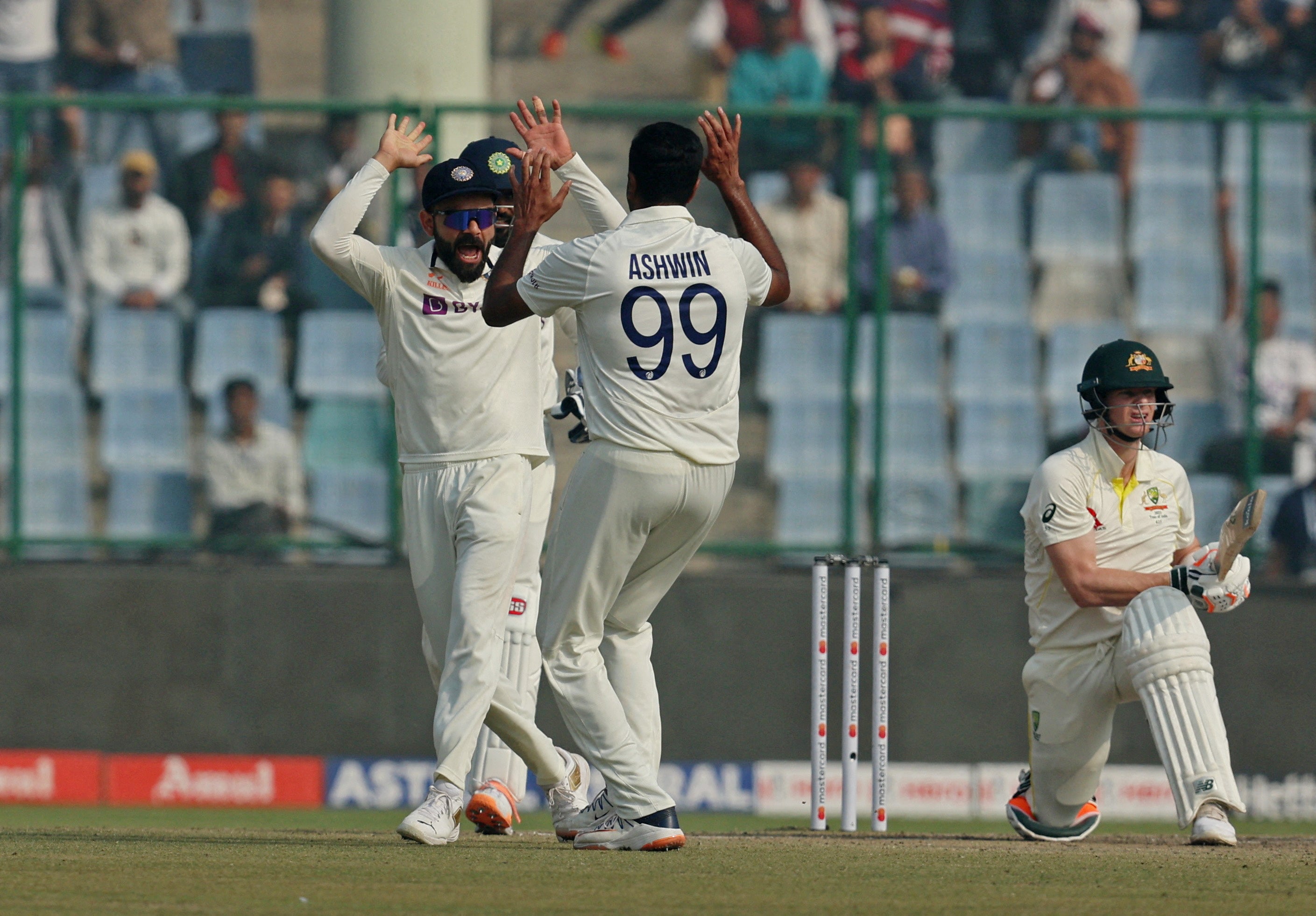 India’s Ravichandran Ashwin celebrates with Virat Kohli against Australia in 2023