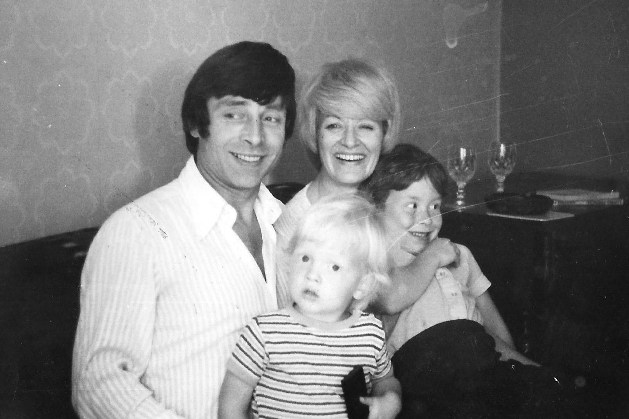 A young Singleton with his parents